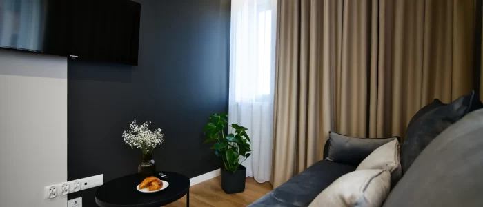 Apartment for 4 - Smart TV and croissants on a coffee table